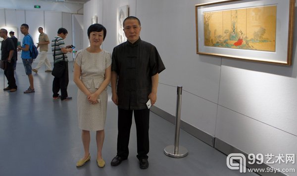 北京德美艺嘉文化产业有限公司总经理董艺女士与江苏省国画院院长周京新先生合影