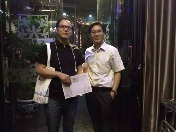 左淮民秘书长与中央美术学院美术馆学术部王春辰主任合影