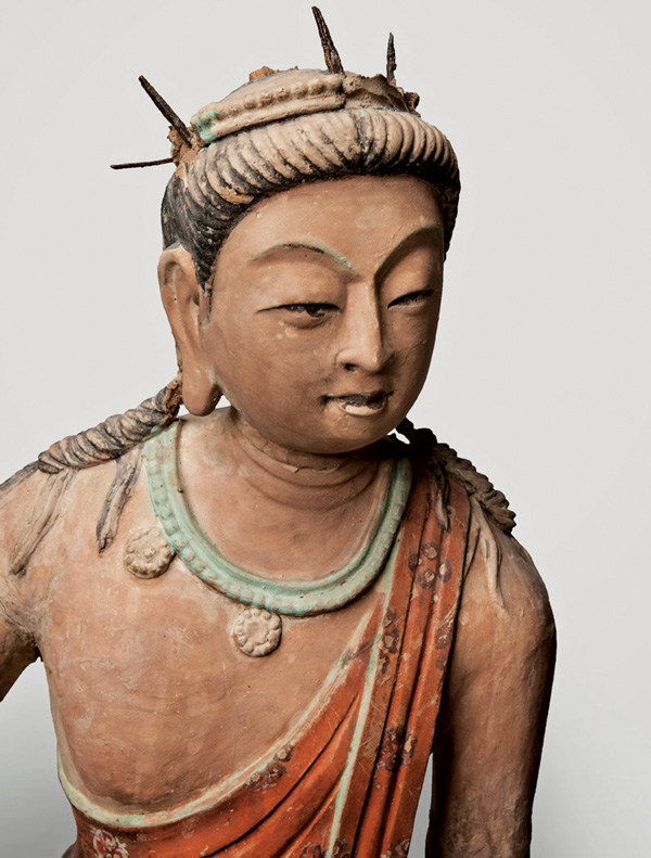 木雕菩萨像，8-9世纪，敦煌出土，藏于艾尔米塔什博物馆