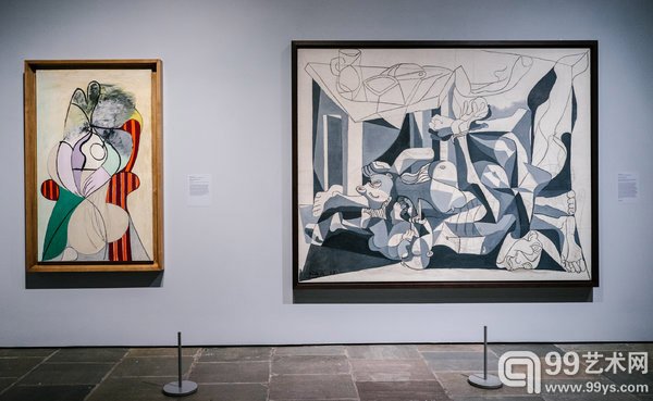 展览现场的毕加索作品：“在红色扶手椅女人”（左）“查耐尔之家。”