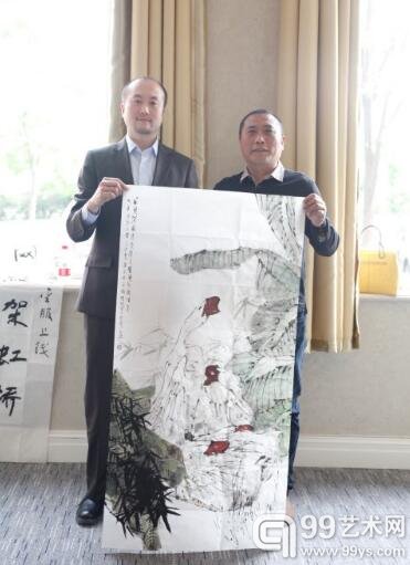 著名画家姚大伍为国艺金服作画