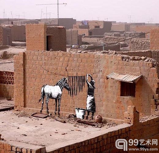 英国地下涂鸦艺术家班克斯的墙上态度