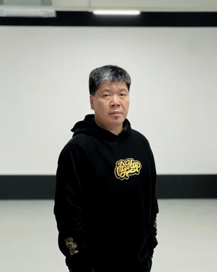 策展人田萌